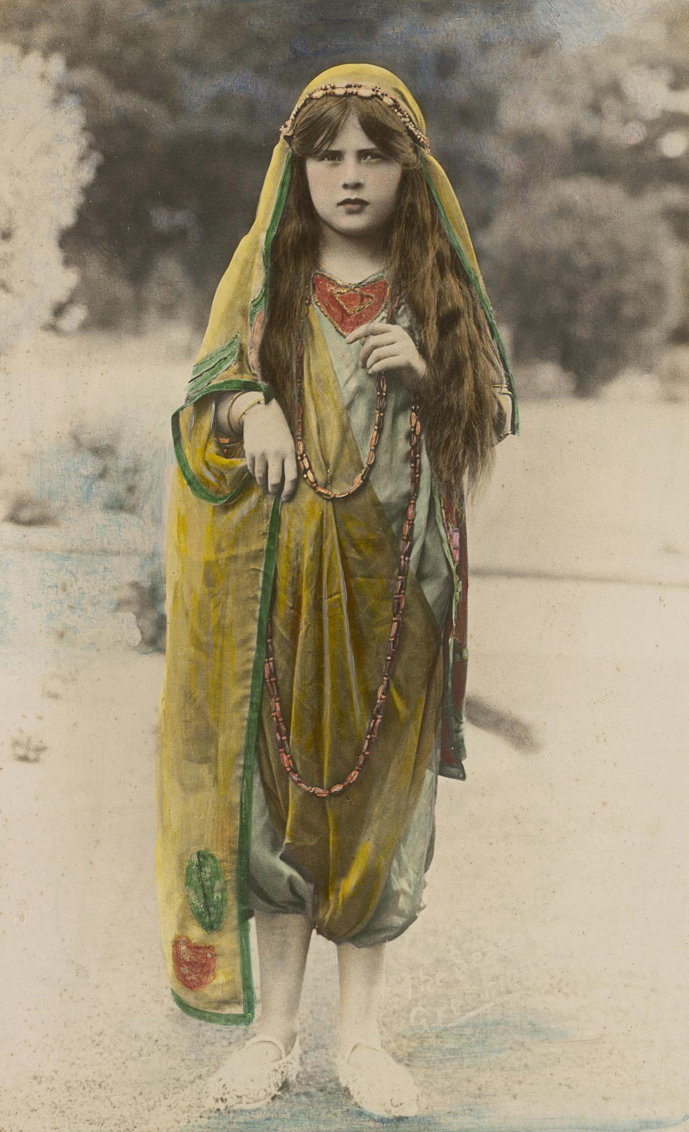 Portrait of a little girl dressed in costume