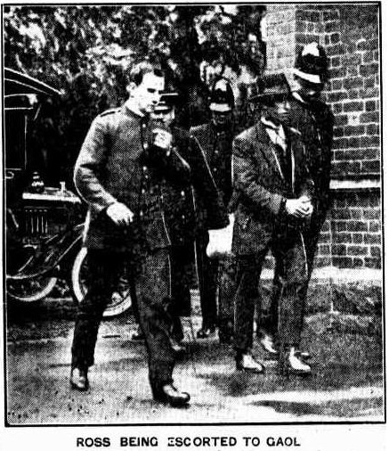 Colin Ross being escorted to gaol.