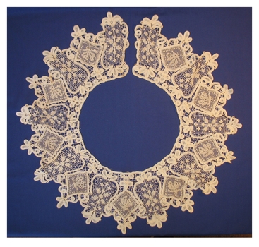 A lace pattern on a white background.