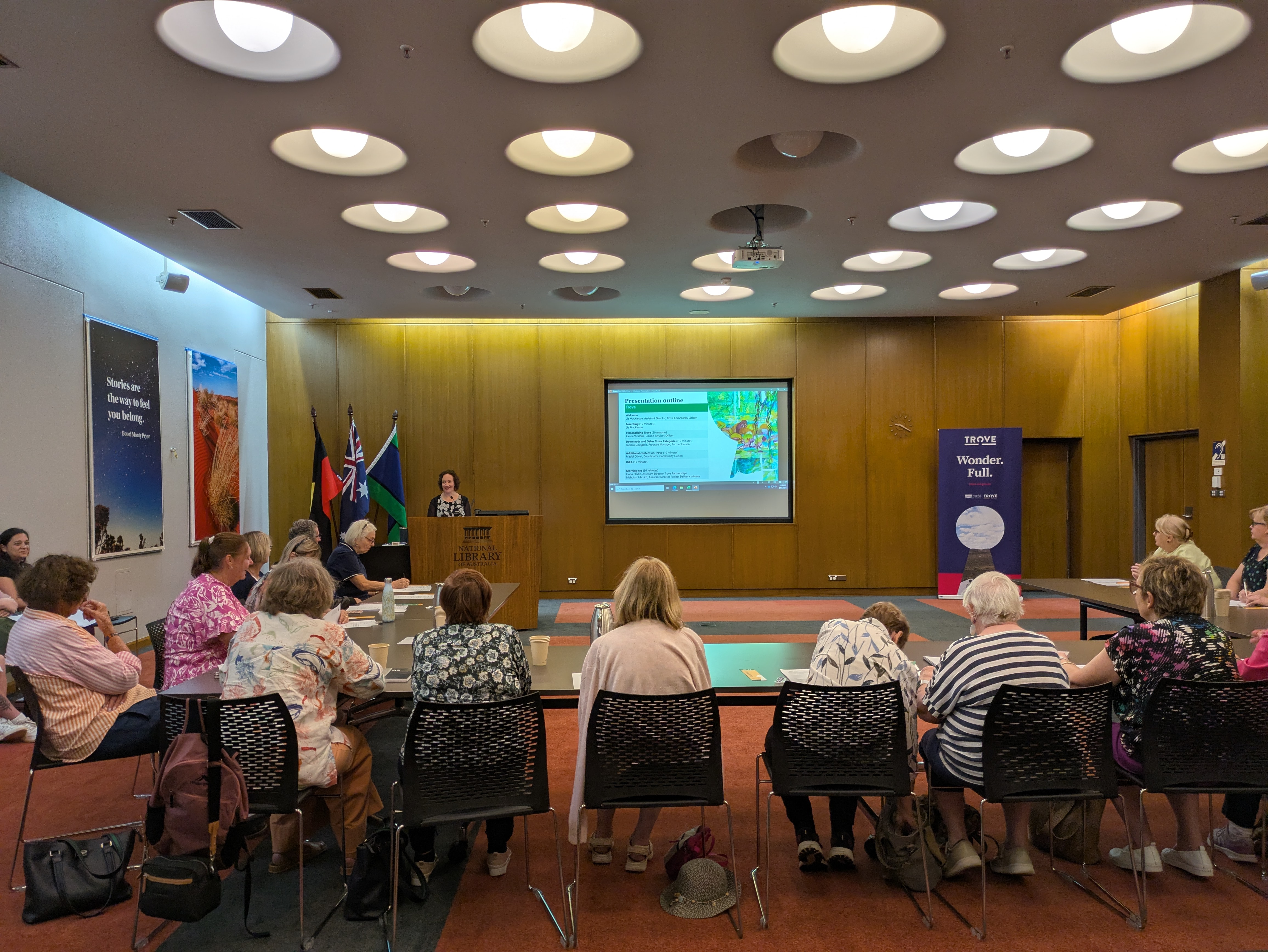 Group of women watching a presentation