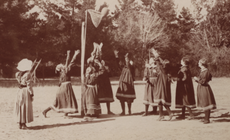 A photo of a group of school girls  participating in basketball (netball) at Loreto College, Mary’s Mount, Ballarat, Victoria, 1901