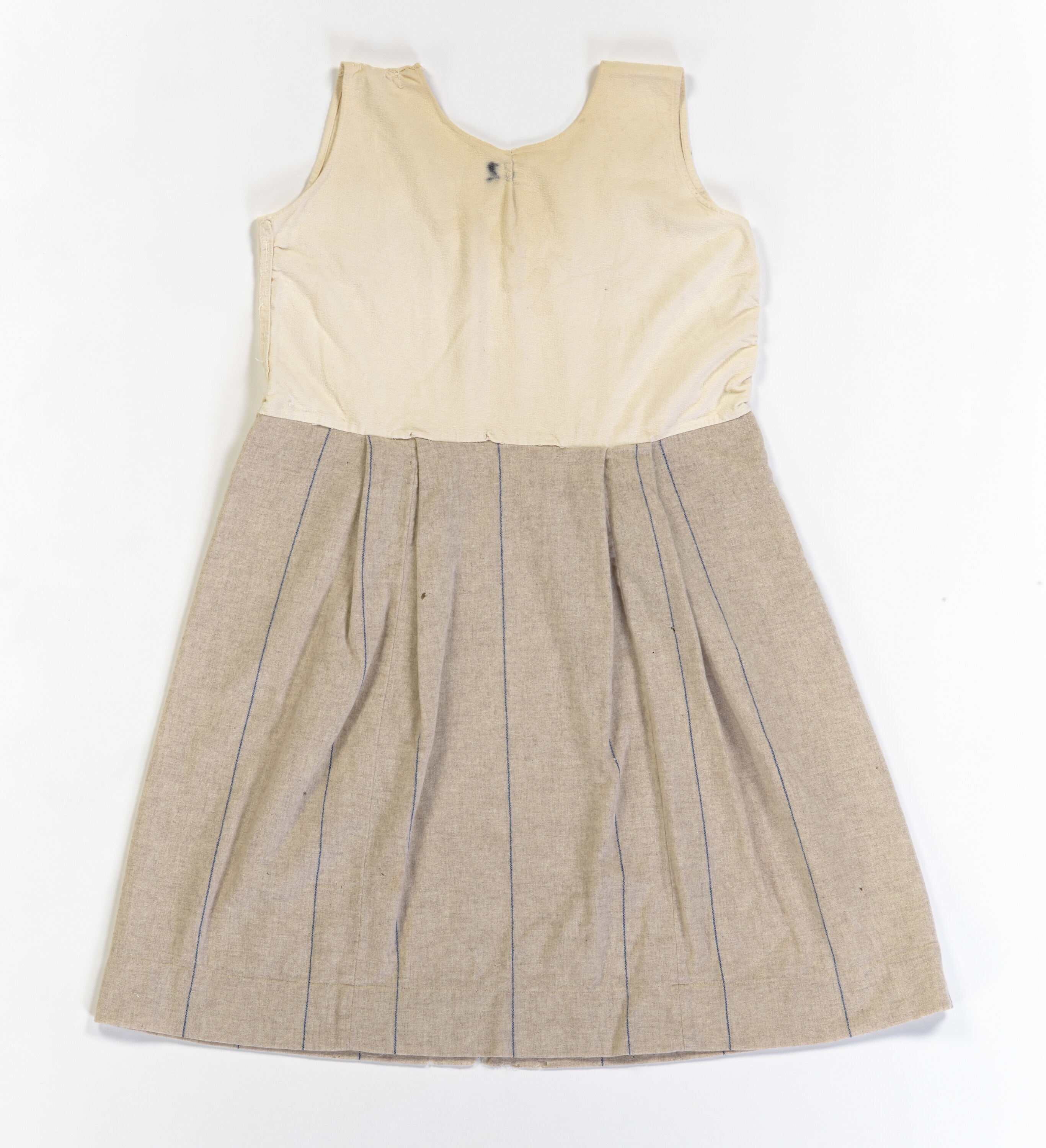 A cream and beige dress.