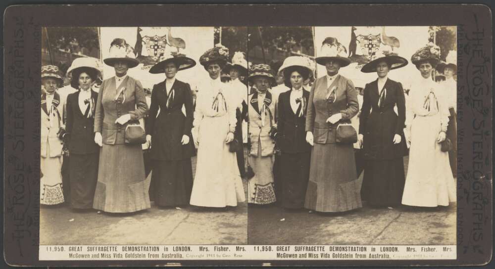 stereograph photo of five women standing in front of a banner with the Australian emblem on it