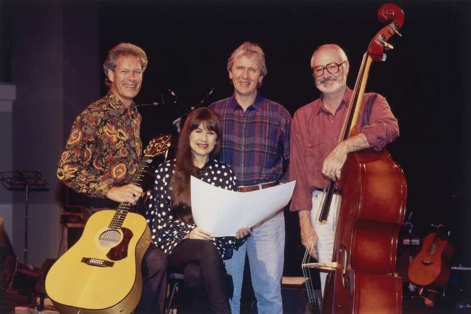 The four members of the seekers smiling for the camera.