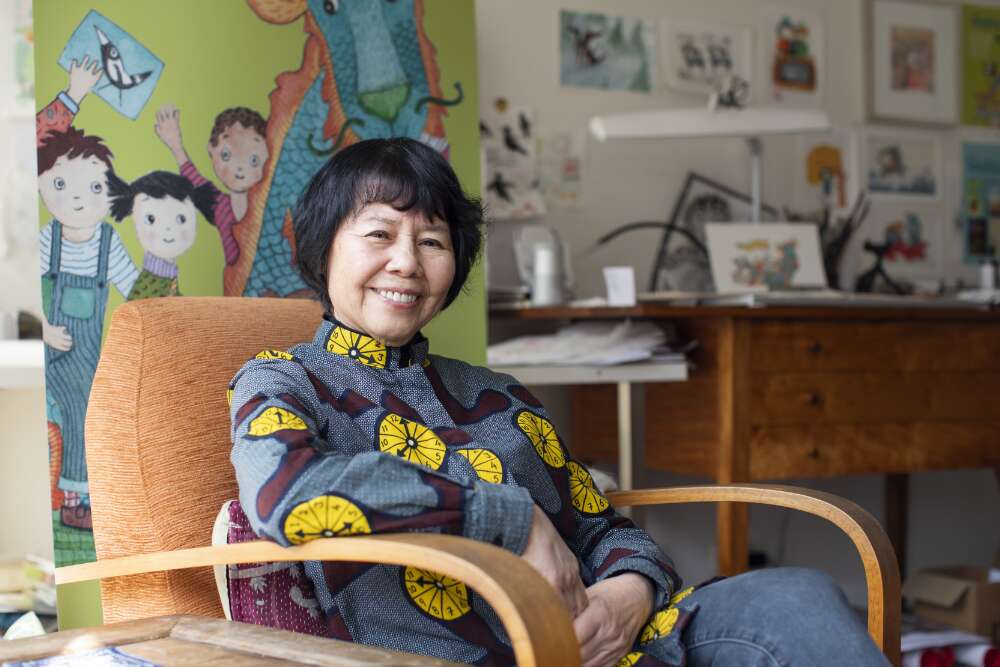 Portrait of Gabrielle Wang sitting in a chair