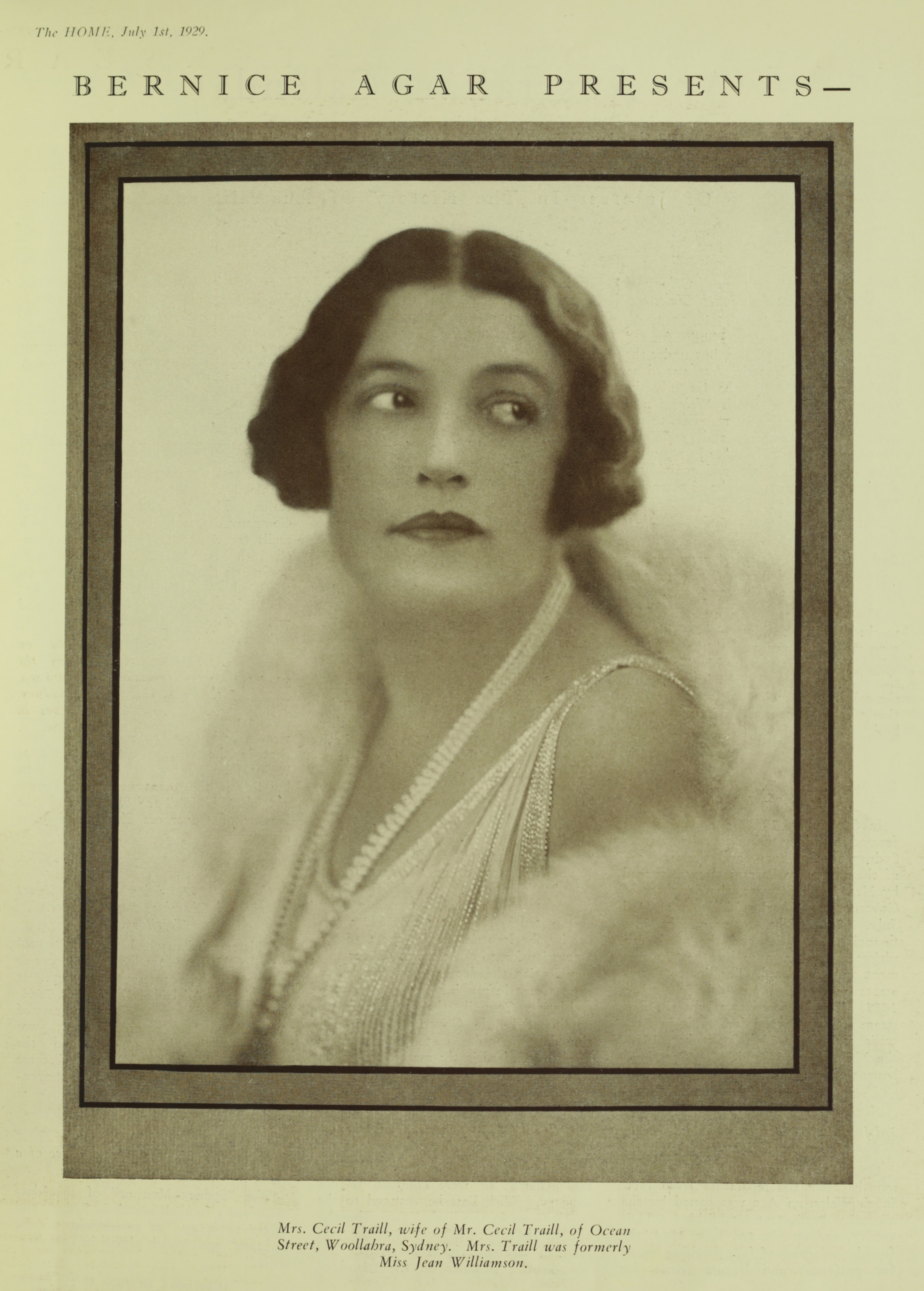 magazine page with fashion photo of a woman wearing fur and pearls