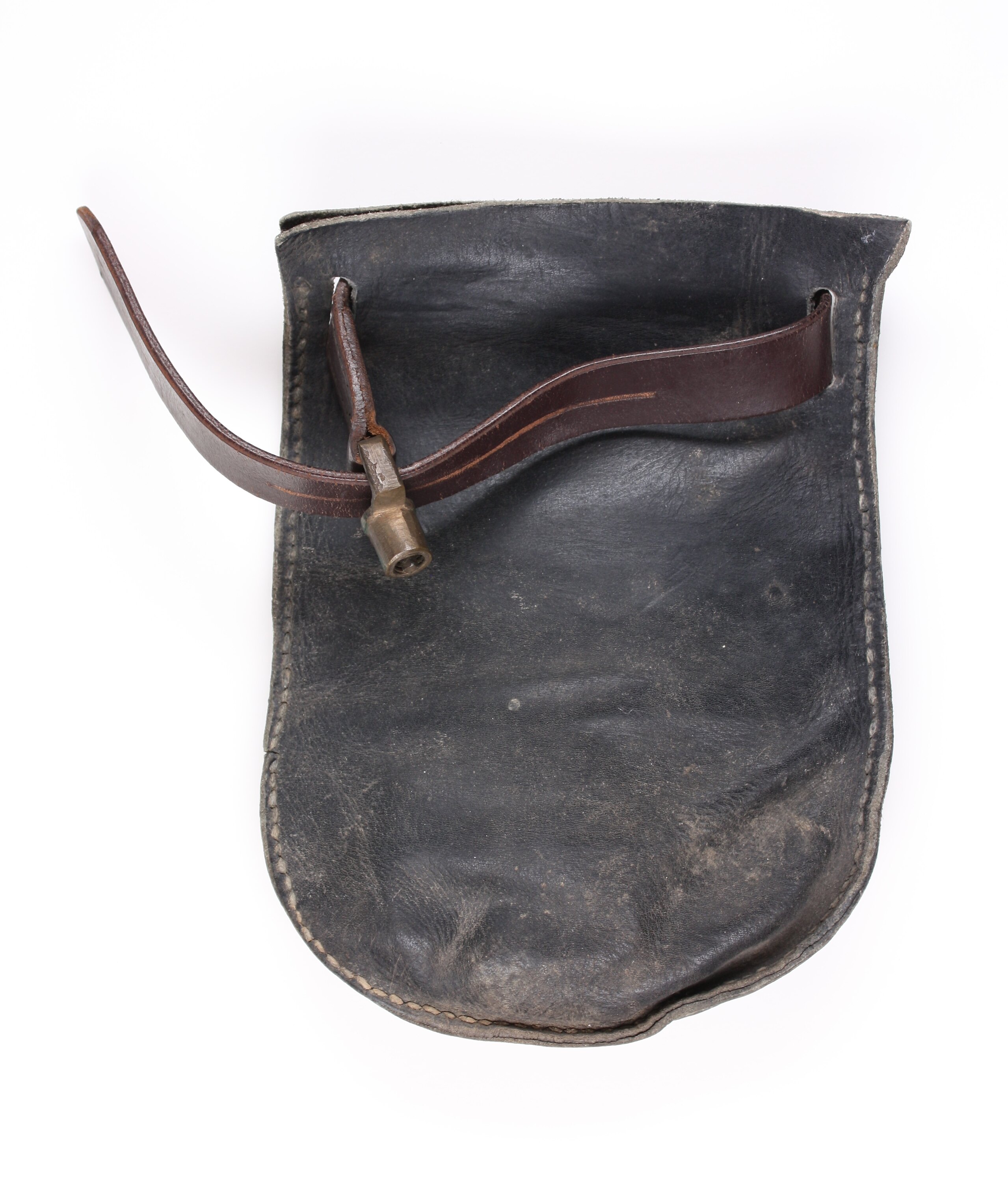 A pair of leather hand covers with a a lock on them.