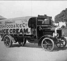 An old timey ice cream truck. 